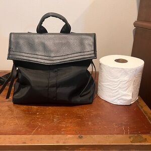 Small black backpack for woman (TP for size comparison)